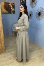 Élégance intemporelle : la trench robe beige