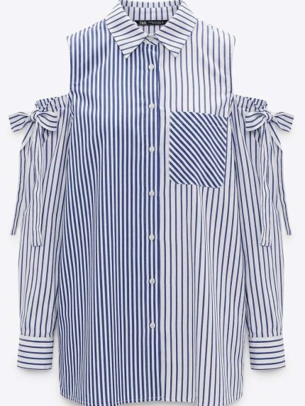 Chemise féminine à rayures bleues et blanches, épaules dénudées avec détails noués aux manches