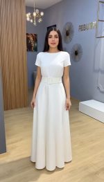 Jupe Blanche Évasée Ceinturée – L'Élégance Épurée pour vos Ensembles