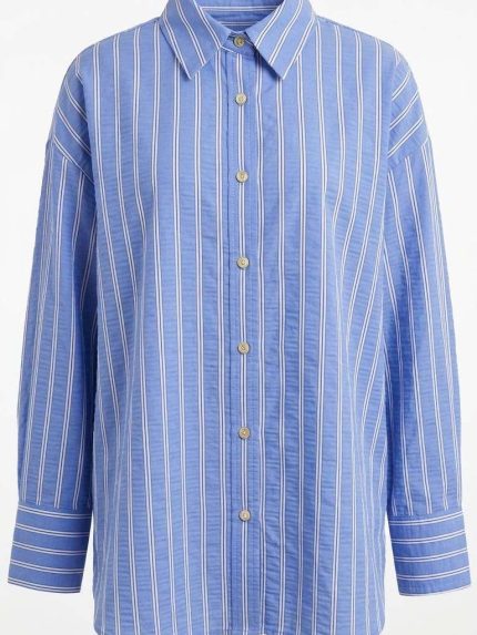 Chemise longue à rayures bleues et blanches pour femme avec manches longues et boutons apparents