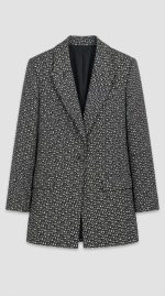 Blazer à motif graphique noir et blanc avec bouton unique, vue de face, collection Orkidia Fashion.