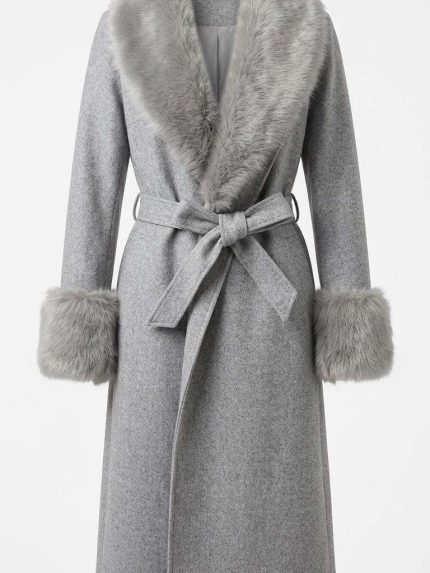 Manteau long gris en laine avec col châle et poignets en fourrure pour femme, style hivernal chic.
